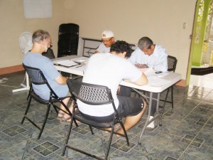 Discipleship group: Andres and Harold are seated on the opposite side of the table facing Jeff Roth and Emiliano.